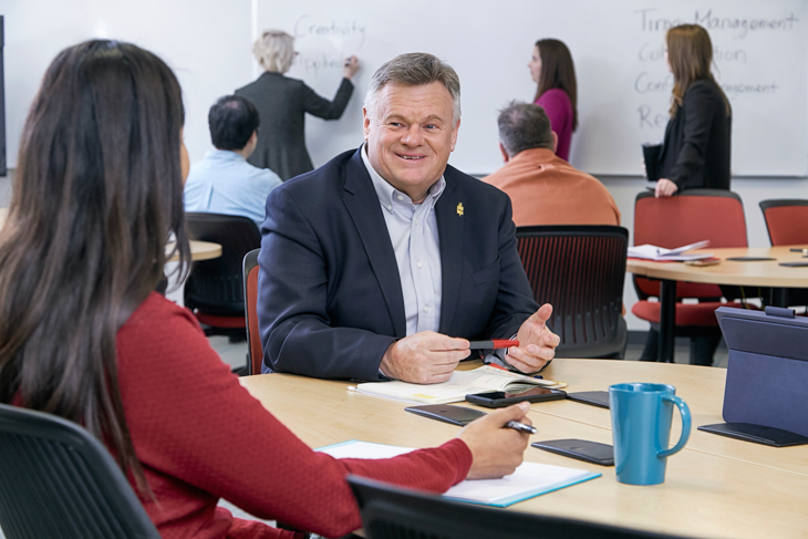 Two people sitting at a table together